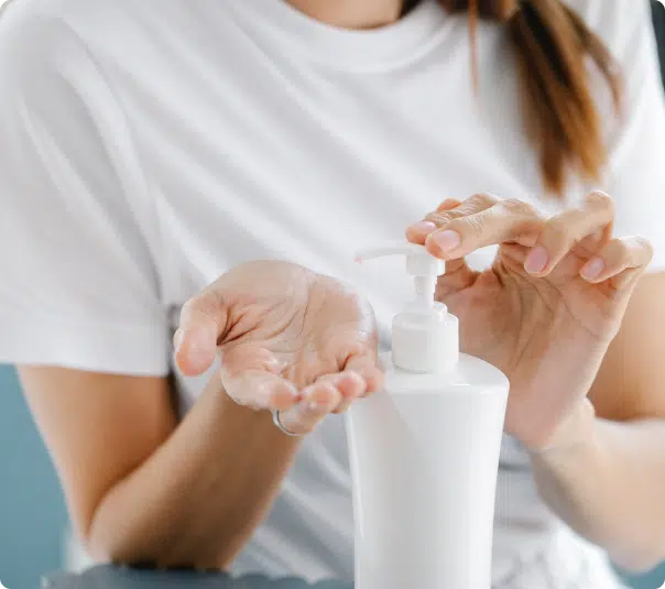 taking lotion from a Plastic Lotion Pump Bottle