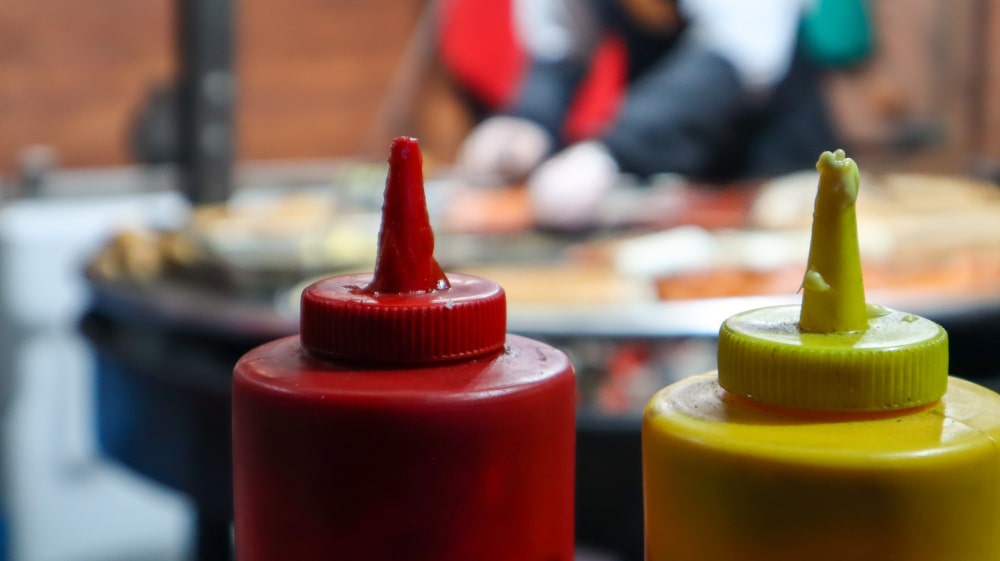 Image of plastic sauce bottles