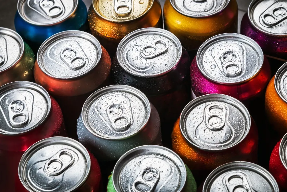 Image of metal cans as espresso packaging
