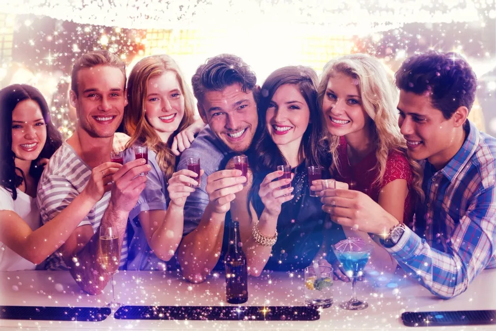 Image of a group of people with alcohol bottles