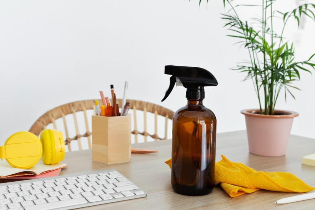 Image of glass spray bottle in a table