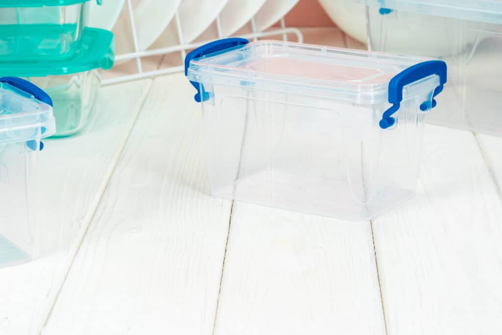 Image of clear plastic containers on the floor