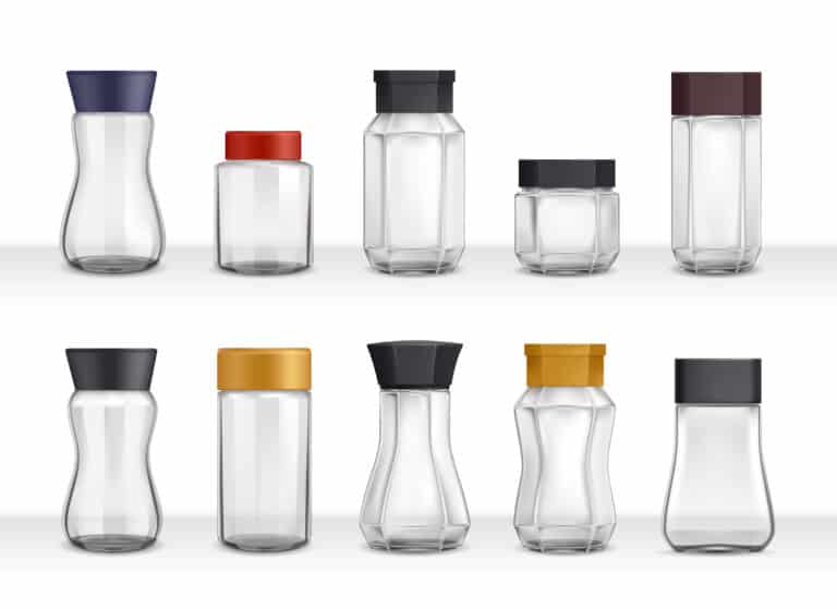 clear plastic bottles with caps in front of a white background