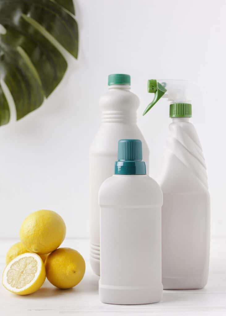 white color 32 oz plastic bottles and few lemons