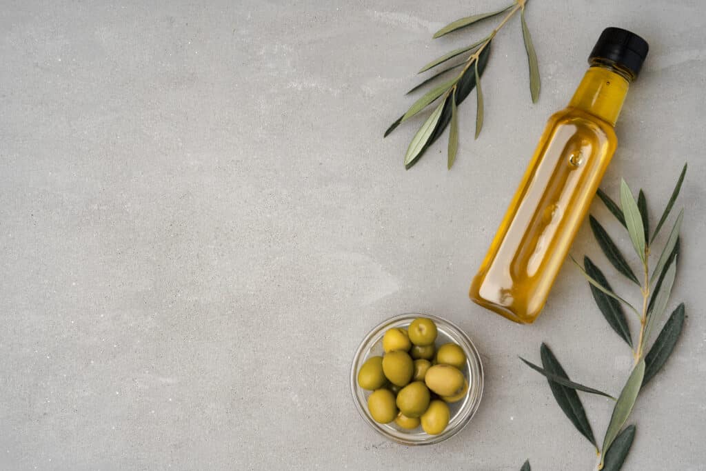 Is Olive Oil in Plastic Bottle on table