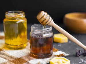 honey in a plastic bottle placed on a table