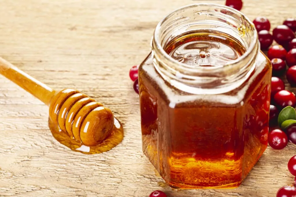 There is how to soften honey in a plastic bottle, where the lid is open and honey taken out from the bottle using a small stick