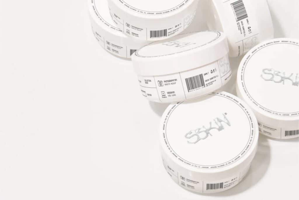 A collection of cosmetic jars showcasing clean and modern packaging design