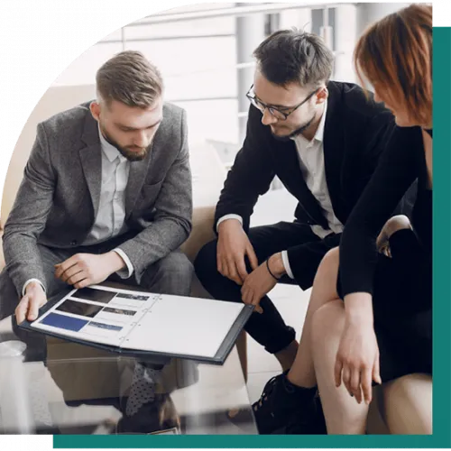 image of three people discussing